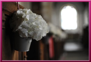 Simple white hydrangea pew ends